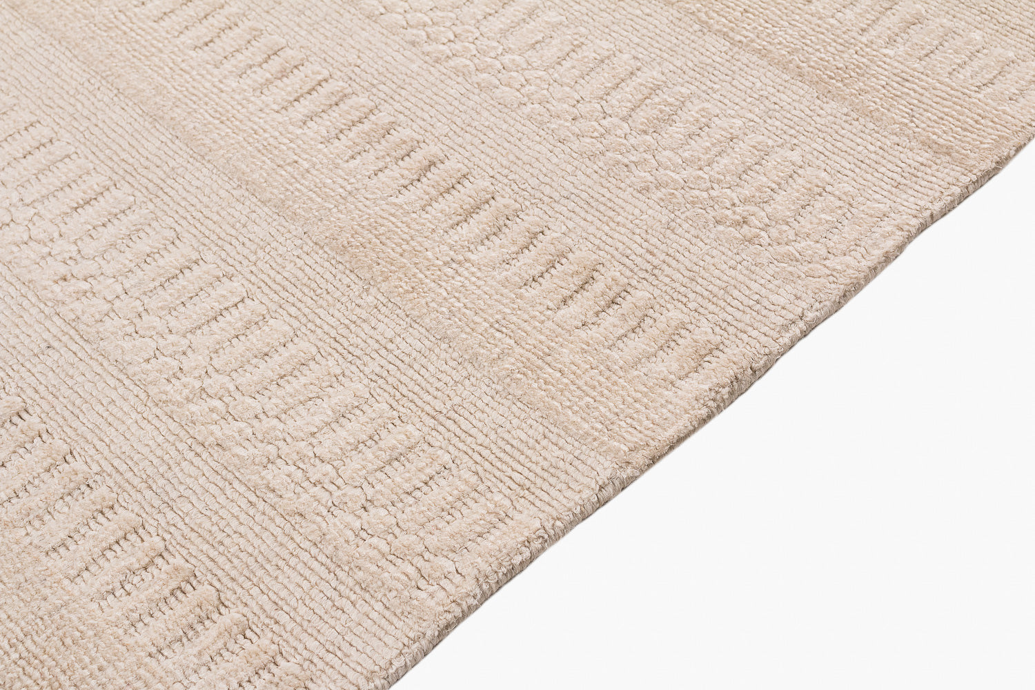 Beige textured rug on a white background
