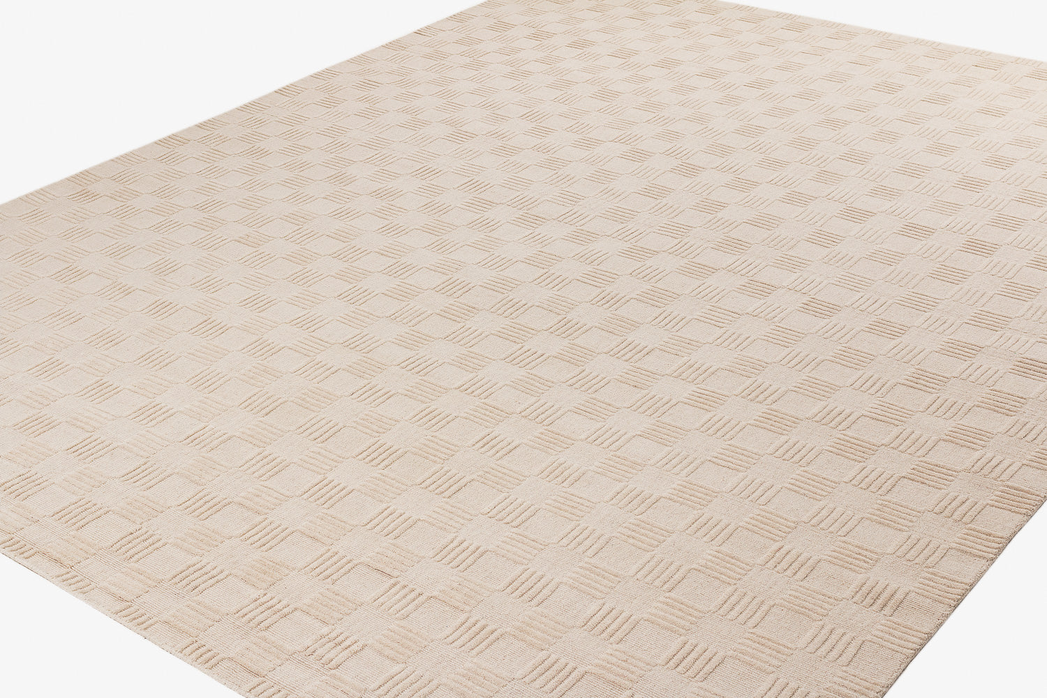 textured beige rug on white background